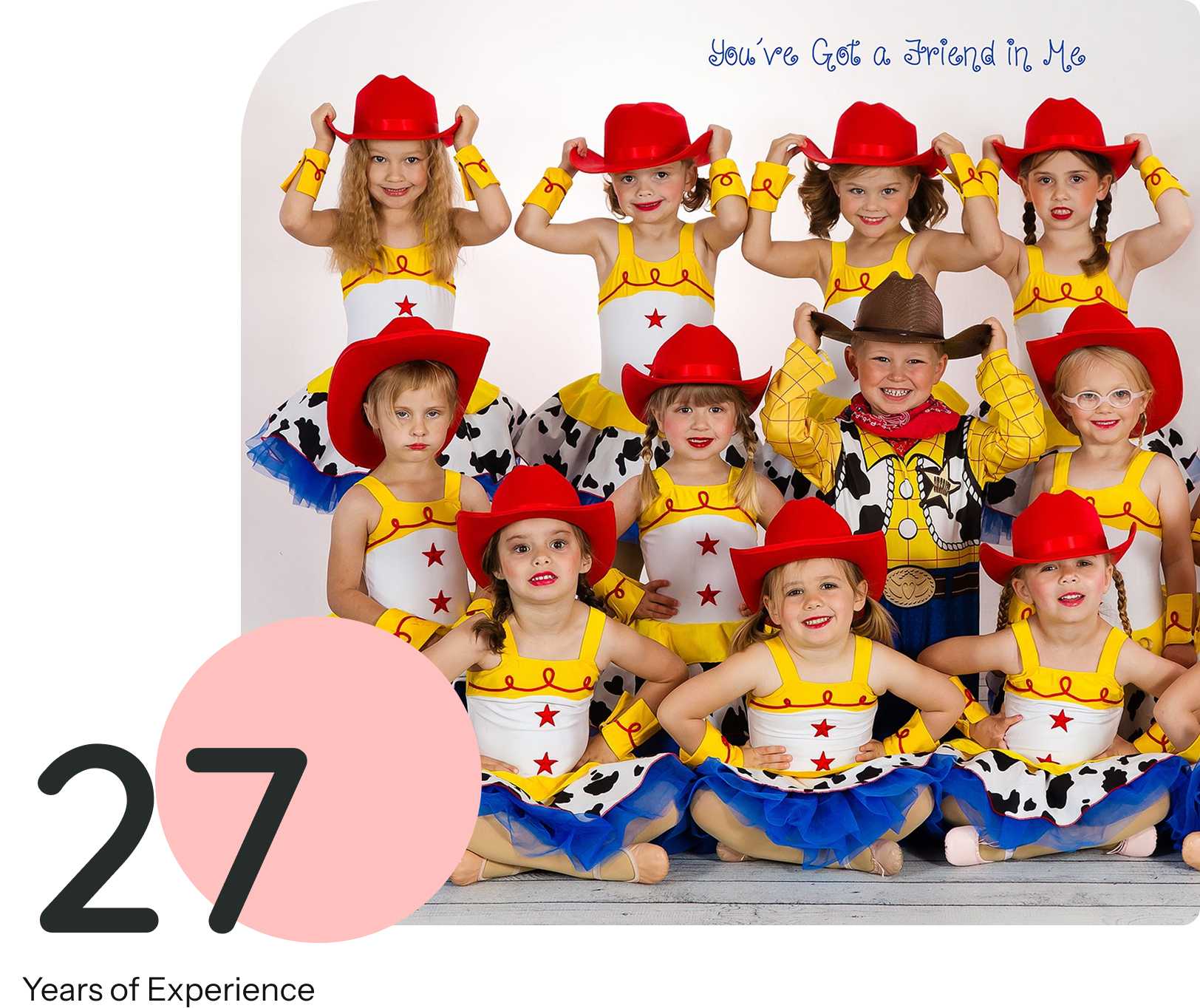 Children in cowboy costumes smiling