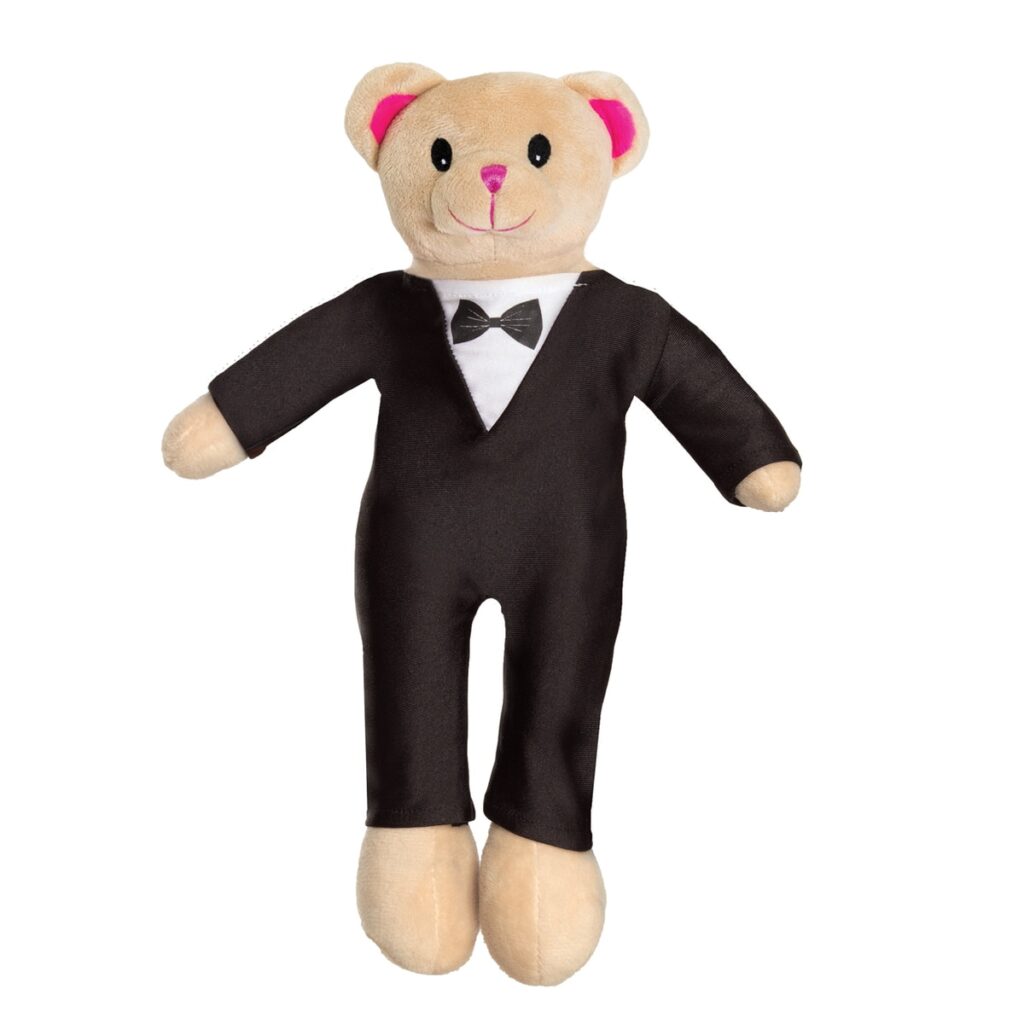 A teddy bear dressed in a black tuxedo with a bow tie.