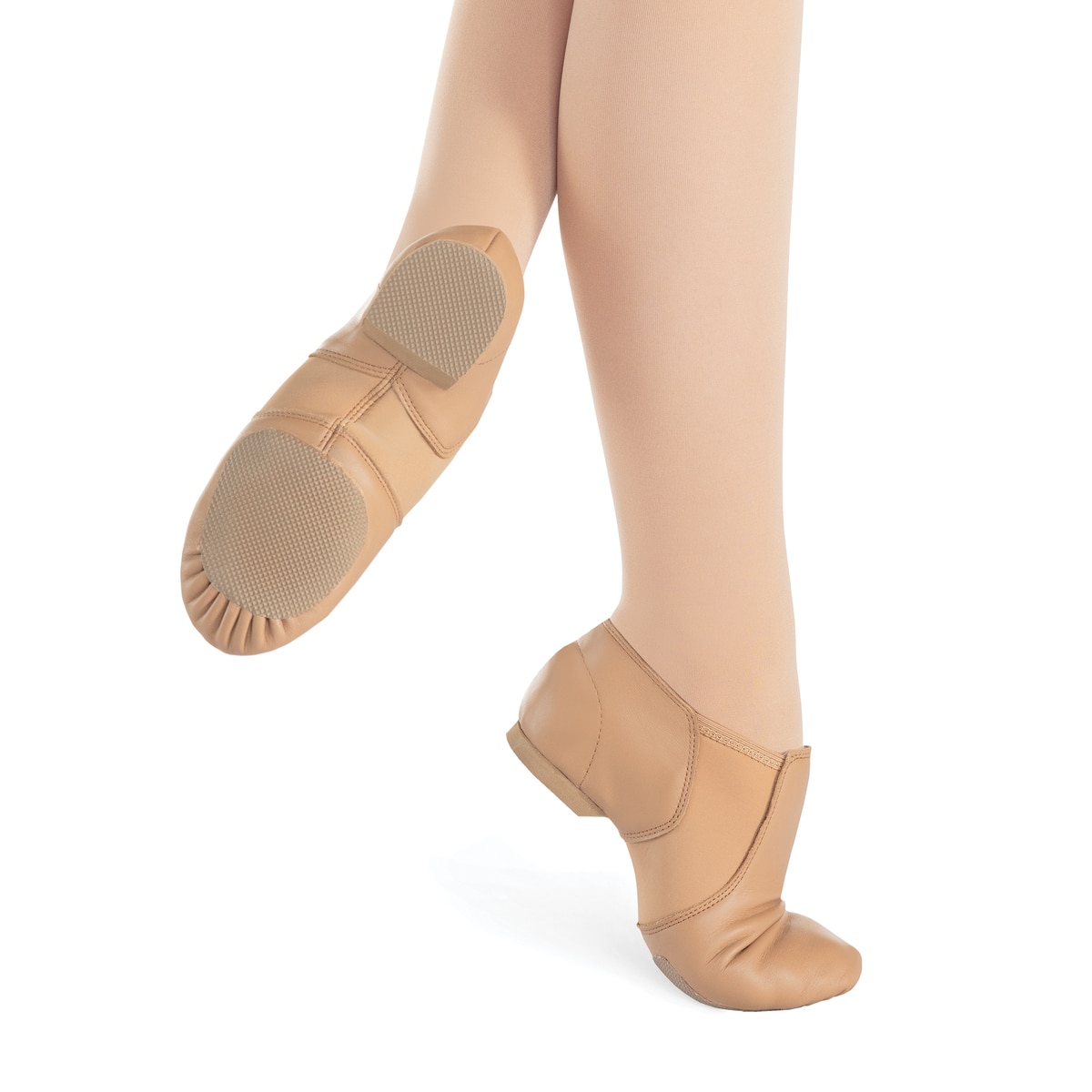 Ballet shoes worn on feet with beige tights.