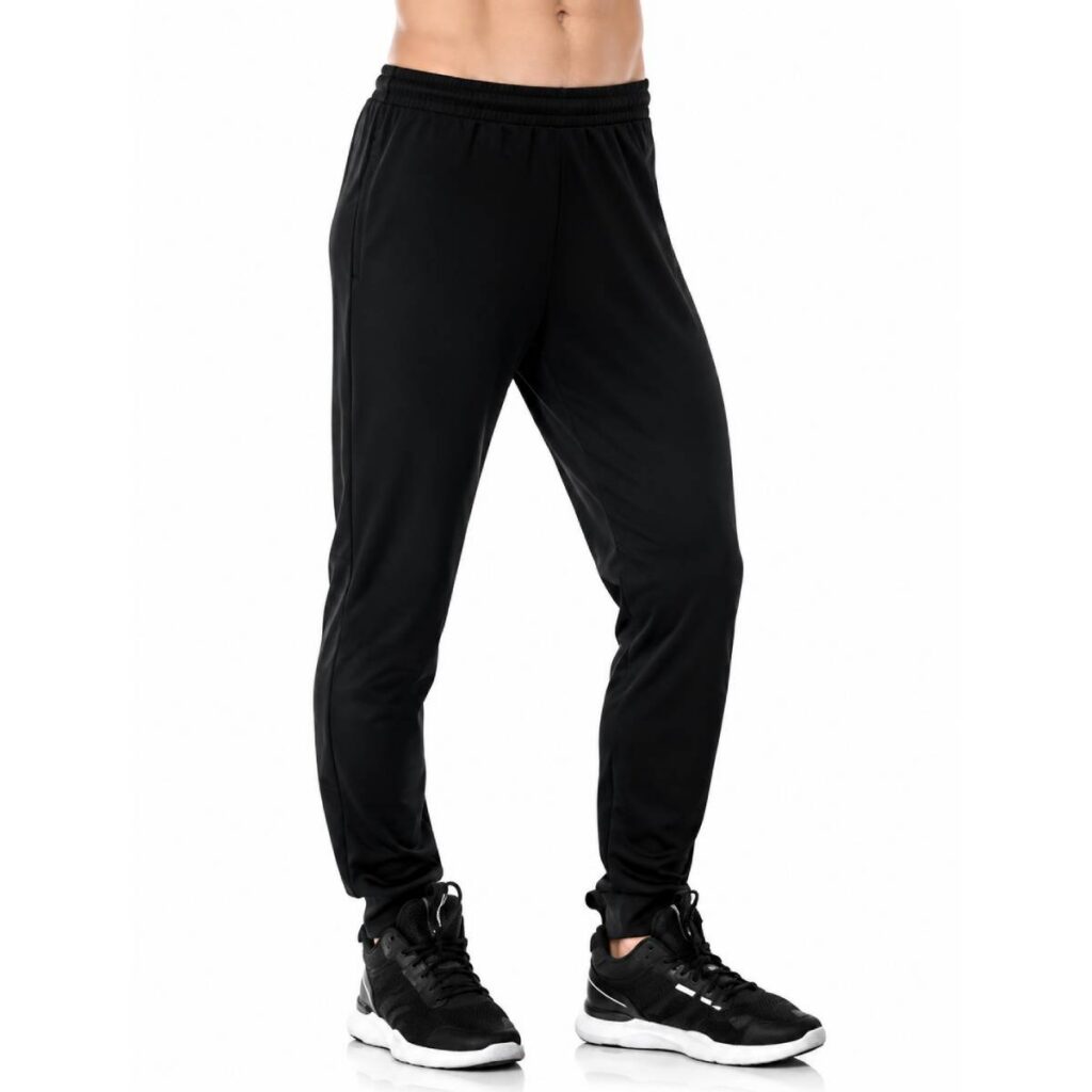 Person wearing black jogger pants and black sneakers.